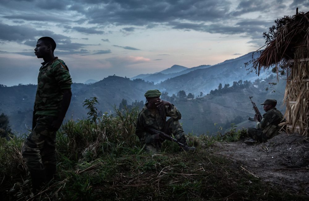 Democratic Republic of the Congo, North Kivu, Masisi, Rubaya. 14/09/2013. The armed rebel movement of the Nyatura was formed by the secession, in 2010, of the CNDP rebel movement, now called M23. Formed mostly by Congolese Hutu, they are led by Colonel Marcel Habarugira. Today some of these rebels have been reintegrated into the regular Congolese army F.A.R.D.C. Without any form of salary, they survive by bullying. through abuse of power, abuse of civilians, raiding night and day and demanding a 10% tax on all forms of activity in the city of Rubaya. Some Nyatura patrol the territory around the mines.©Marco Gualazzini/ Getty Images Grants for Editorial Photography Recipient 2013